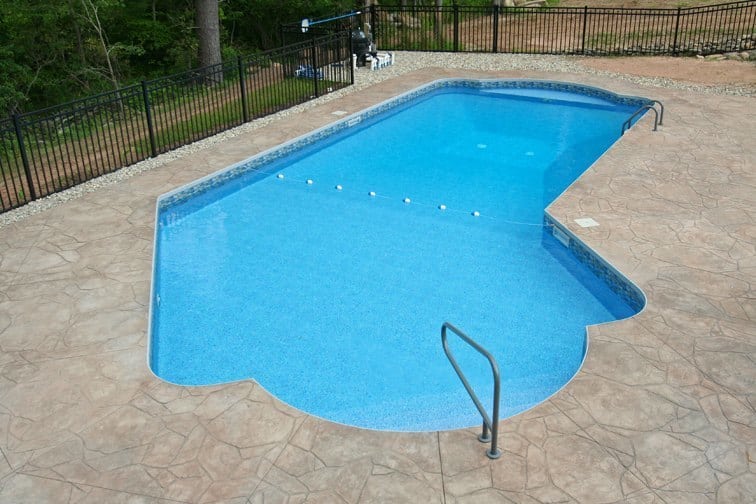 Custom Lazy L Inground Pool installed by Cypress Pools